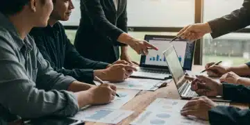 Group discussing strategic retirement planning with a financial advisor, reviewing 401k and IRA options