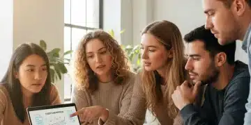 Young adults discussing student loan repayment strategies on a laptop in 2026